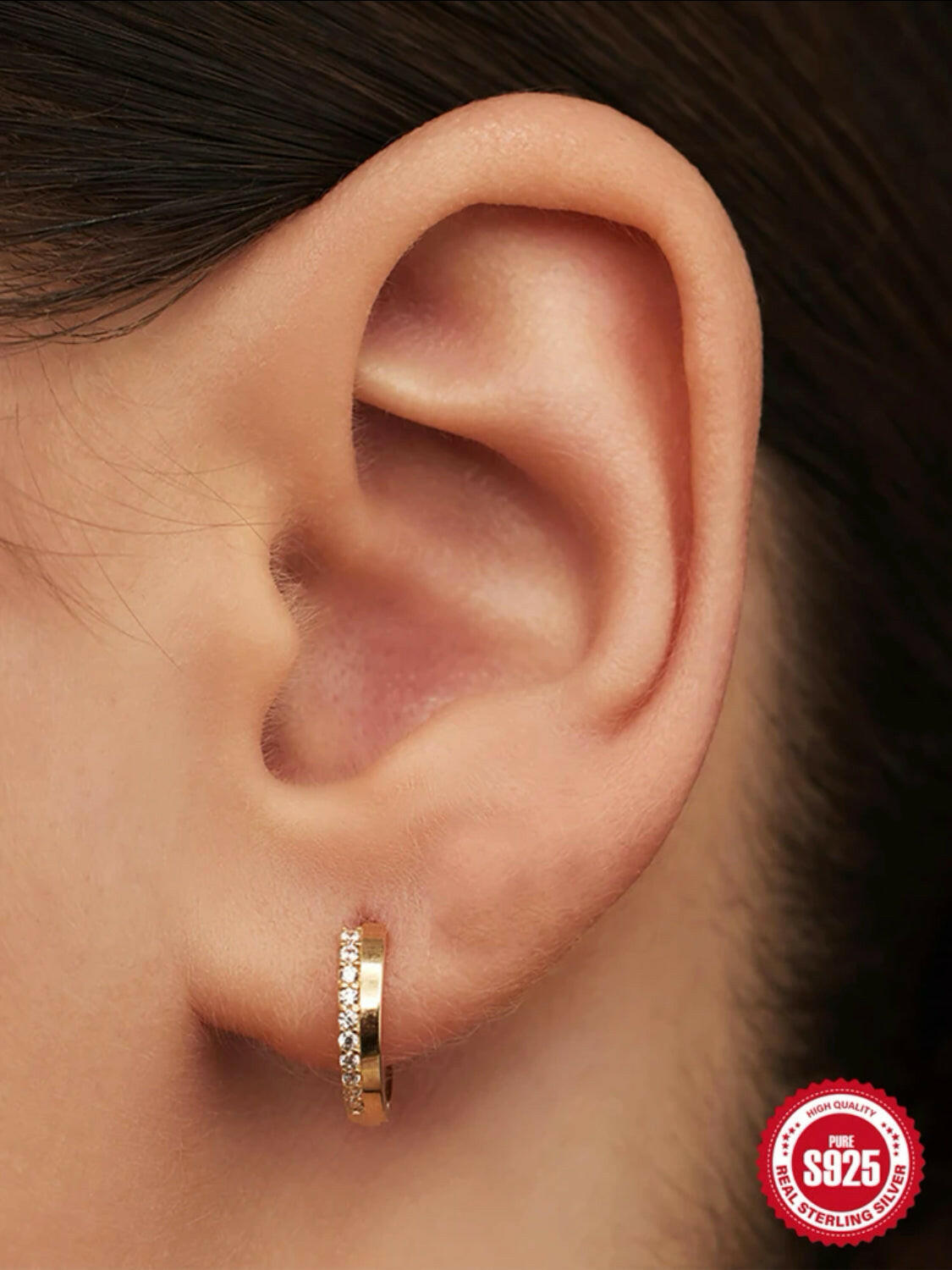 These S925 Sterling Silver Half Pave Cubic Zirconia Earrings feature a luxurious half-pave design, with sparkling cubic zirconia stones. The durable sterling silver setting ensures a long-lasting shine. Perfect for formal or everyday wear!