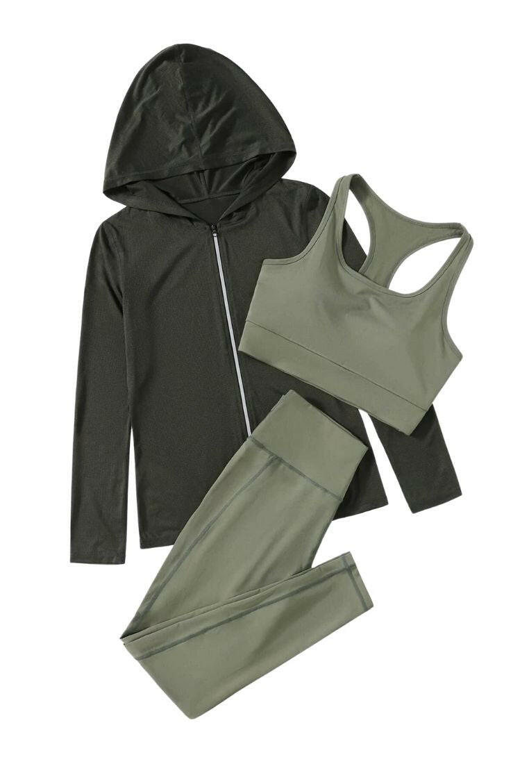 Image of a 3-piece breathable sports set. The set includes a top, leggings, and matching accessories, all crafted from breathable materials, providing comfort and functionality for various physical activities.