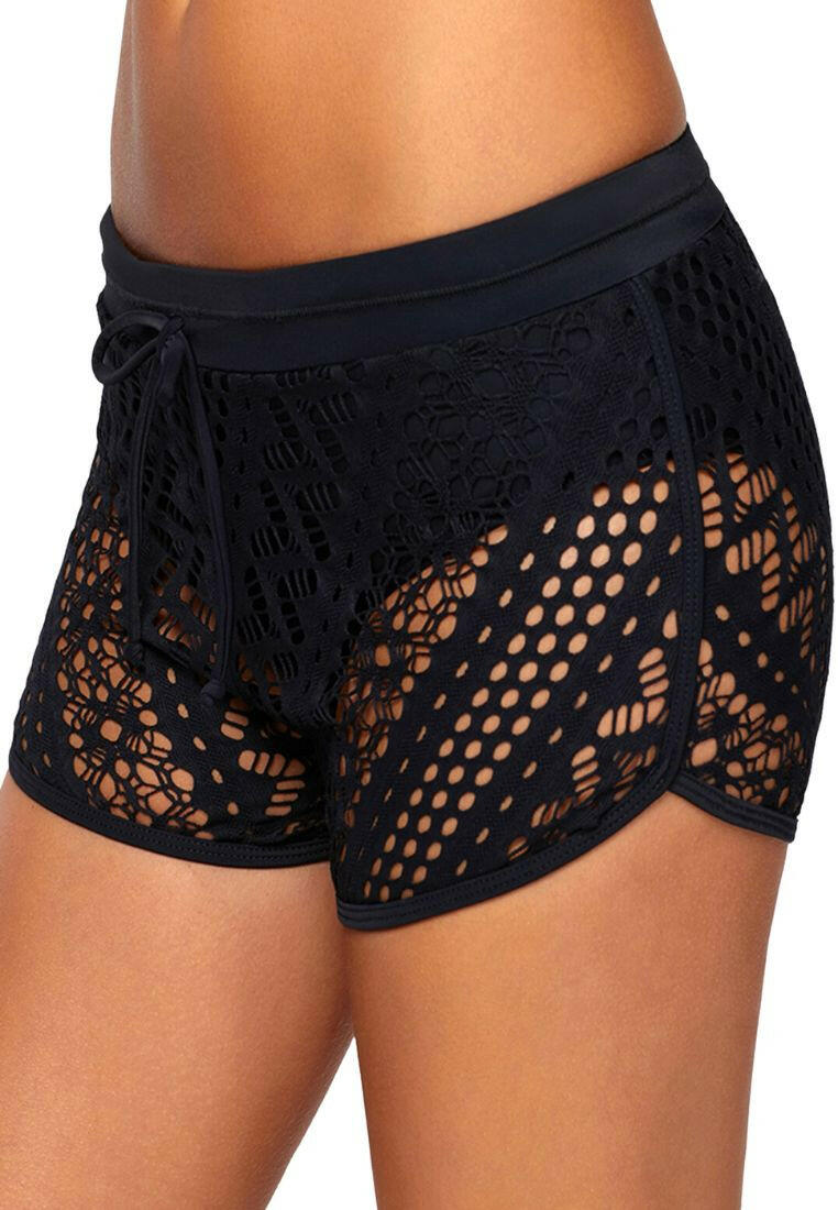 Black swim shorts with intricate hollow-out lace overlay. These shorts feature a sophisticated design with delicate lace patterns layered over a black base. The lace overlay adds a touch of elegance to the swimwear, creating a stylish and fashionable look. The shorts provide both comfort and coverage, making them a versatile choice for poolside or beach activities. The combination of black color and lace detailing exudes a sense of refinement and charm.