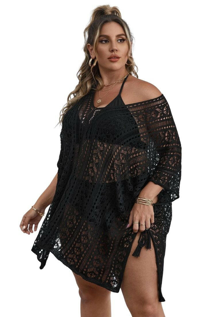 Plus size knitted hollow out cover-up, a fashionable and inclusive beachwear accessory. This cover-up features a knitted fabric with intricate hollow-out patterns, designed for larger sizes. Its textured design and openwork detailing make it a stylish choice for layering over swimwear. The plus size fit ensures comfort and confidence, adding a touch of elegance to your beach ensemble.