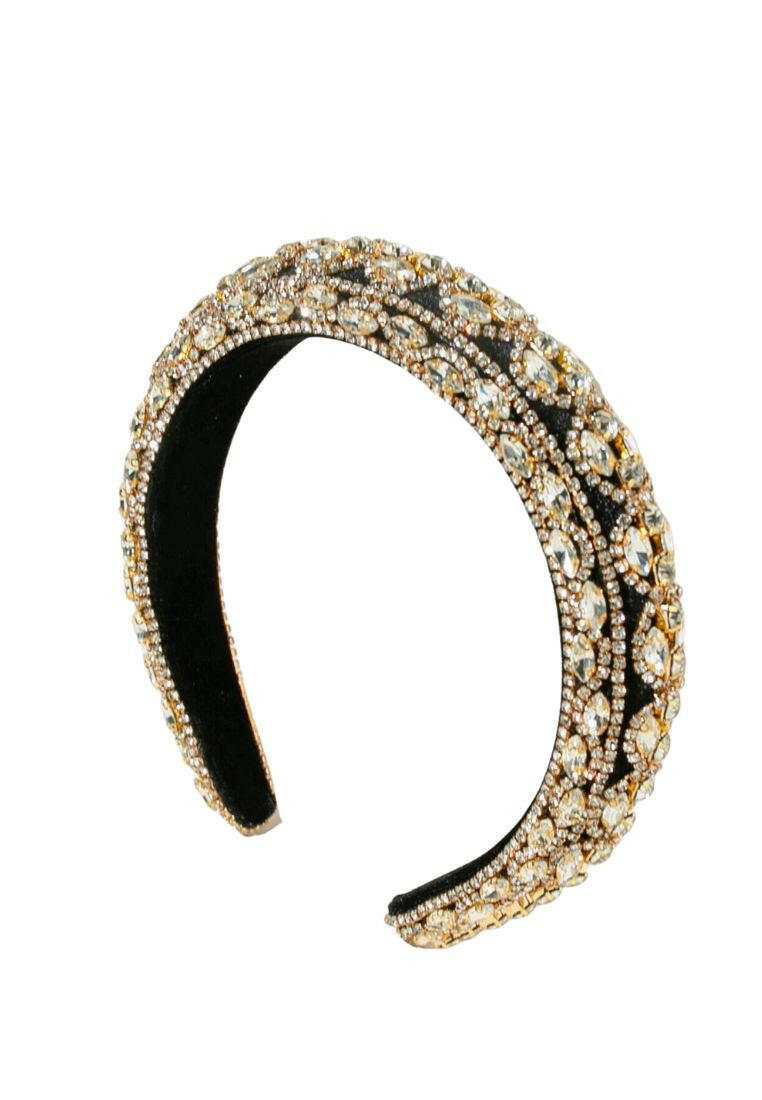 Headband adorned with rhinestones, providing a touch of elegance and sparkle to your hair look.