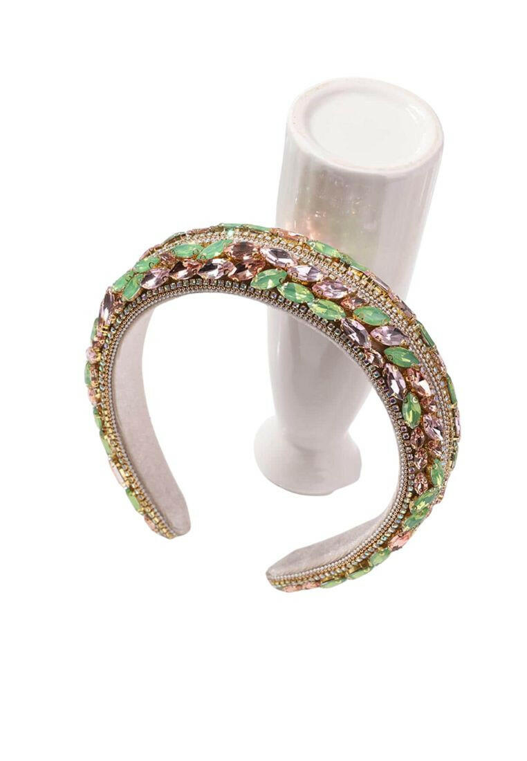 Glamorous headband adorned with green rhinestone decorations, adding a touch of elegance and sparkle to your hair accessory.