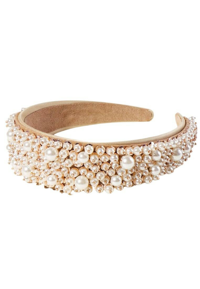 A hair hoop adorned with faux pearl beads, providing a chic and elegant accessory for your hair styling.