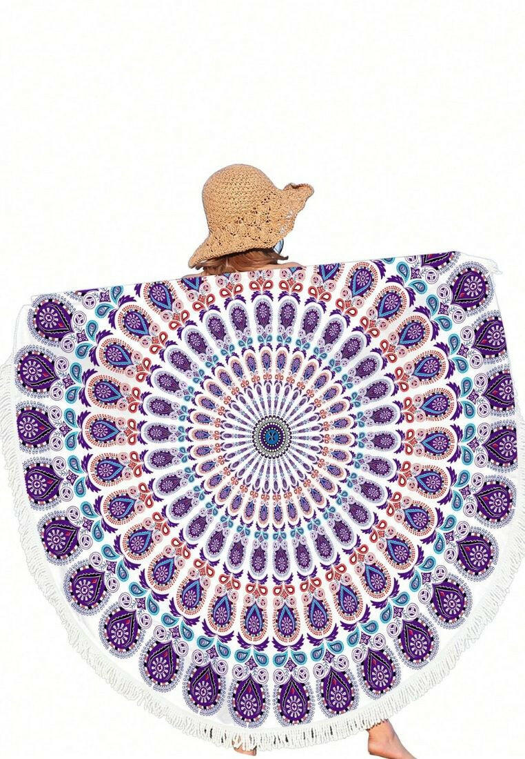A beach towel featuring a purple mandala pattern and fringe trim. The towel showcases an intricate mandala design in shades of purple, with decorative fringe trim along the edges. This towel is both stylish and functional, perfect for beach outings or outdoor relaxation. The purple mandala pattern and fringe trim add a touch of bohemian elegance to the towel.