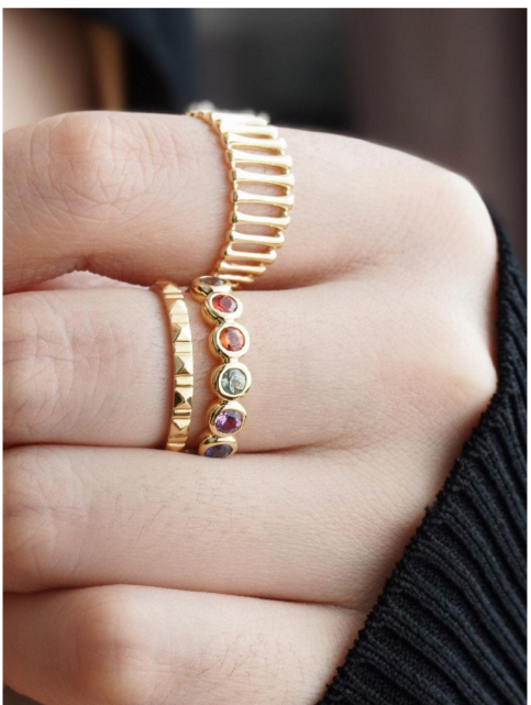 A glamorous sterling silver ring adorned with cubic zirconia gems. The ring features sparkling cubic zirconia stones set within an intricately designed sterling silver setting. The combination of the shimmering gemstones and the lustrous silver creates a captivating and elegant look. This ring is a stylish and sophisticated accessory that adds a touch of opulence and luxury to any outfit.