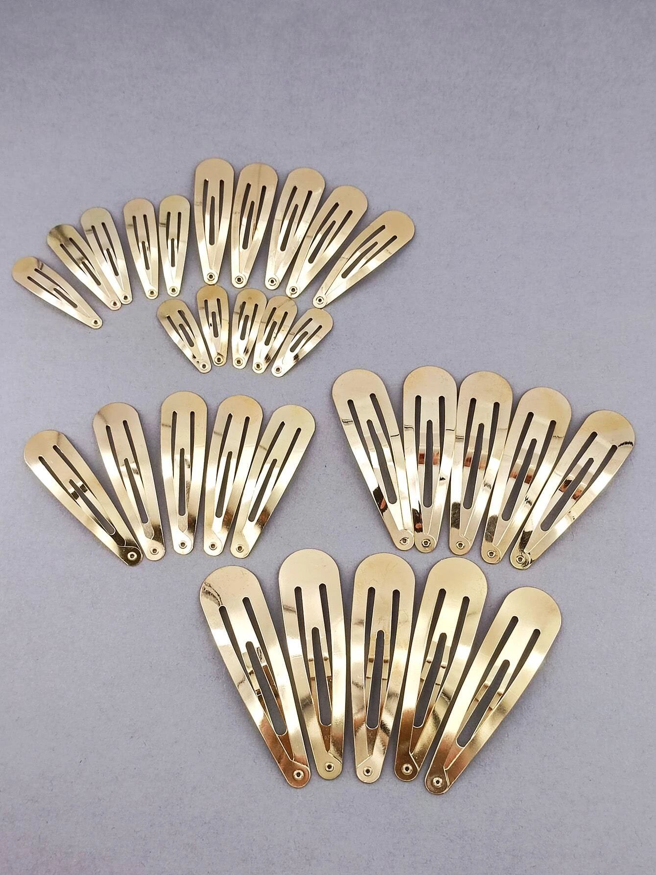 A set of 30 minimalist snap clips, offering sleek and simple hair accessories for versatile styling.