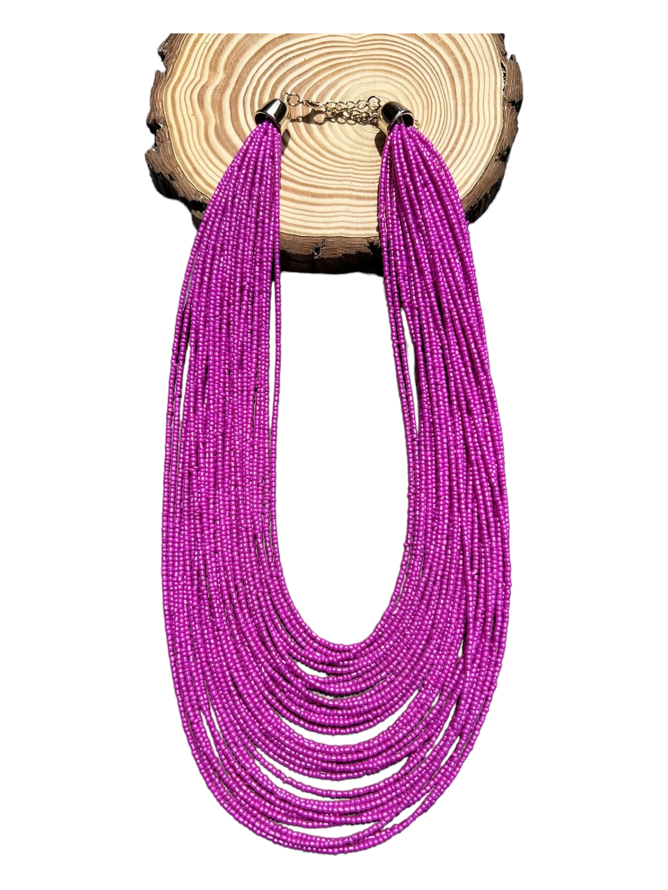 Chic layered necklace composed of solid beads. The necklace showcases multiple strands of beads in a variety of sizes, shapes, and colors, creating a textured and stylish accessory. The beads are strung together in a layered arrangement, offering a contemporary and versatile addition to your ensemble.