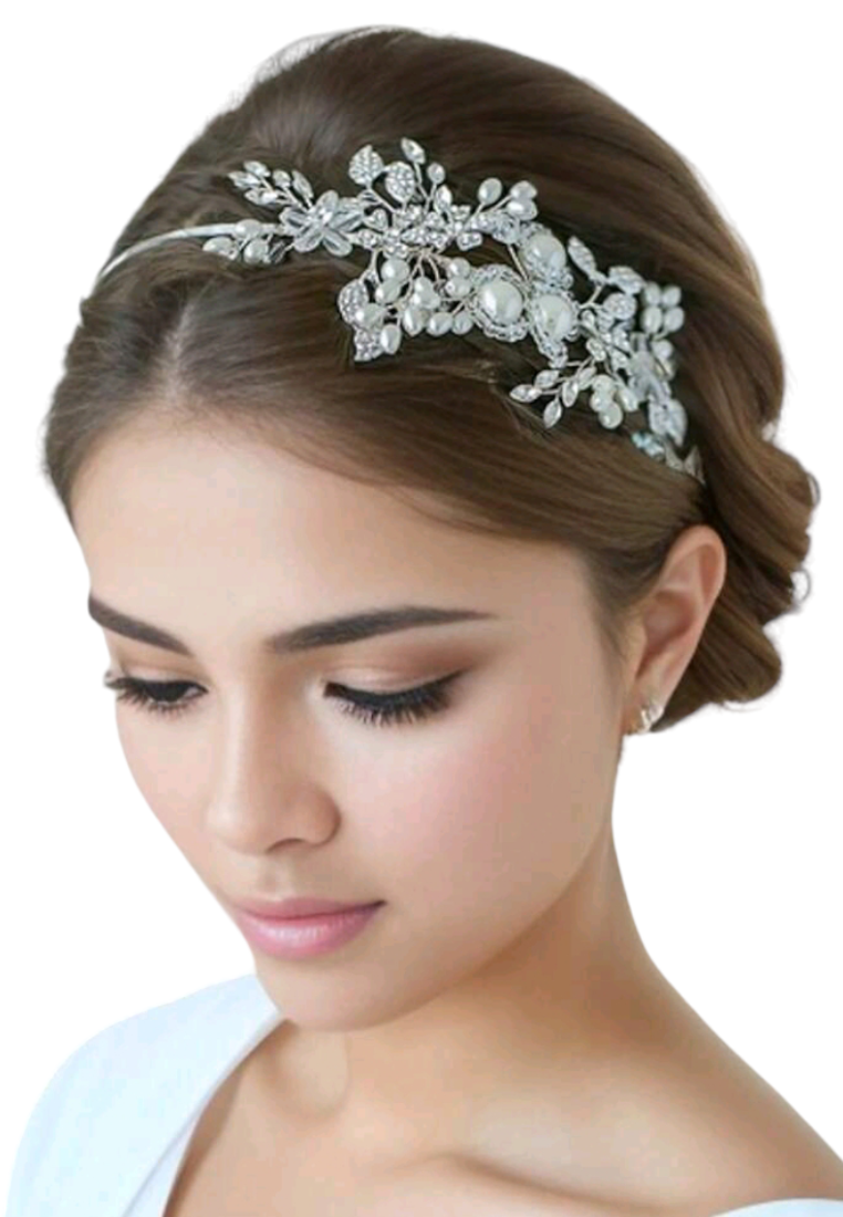 An elegant bridal headband adorned with faux pearls and delicate decorative elements. The headband features a graceful arrangement of lustrous faux pearls, creating a timeless and sophisticated look for brides on their special day.