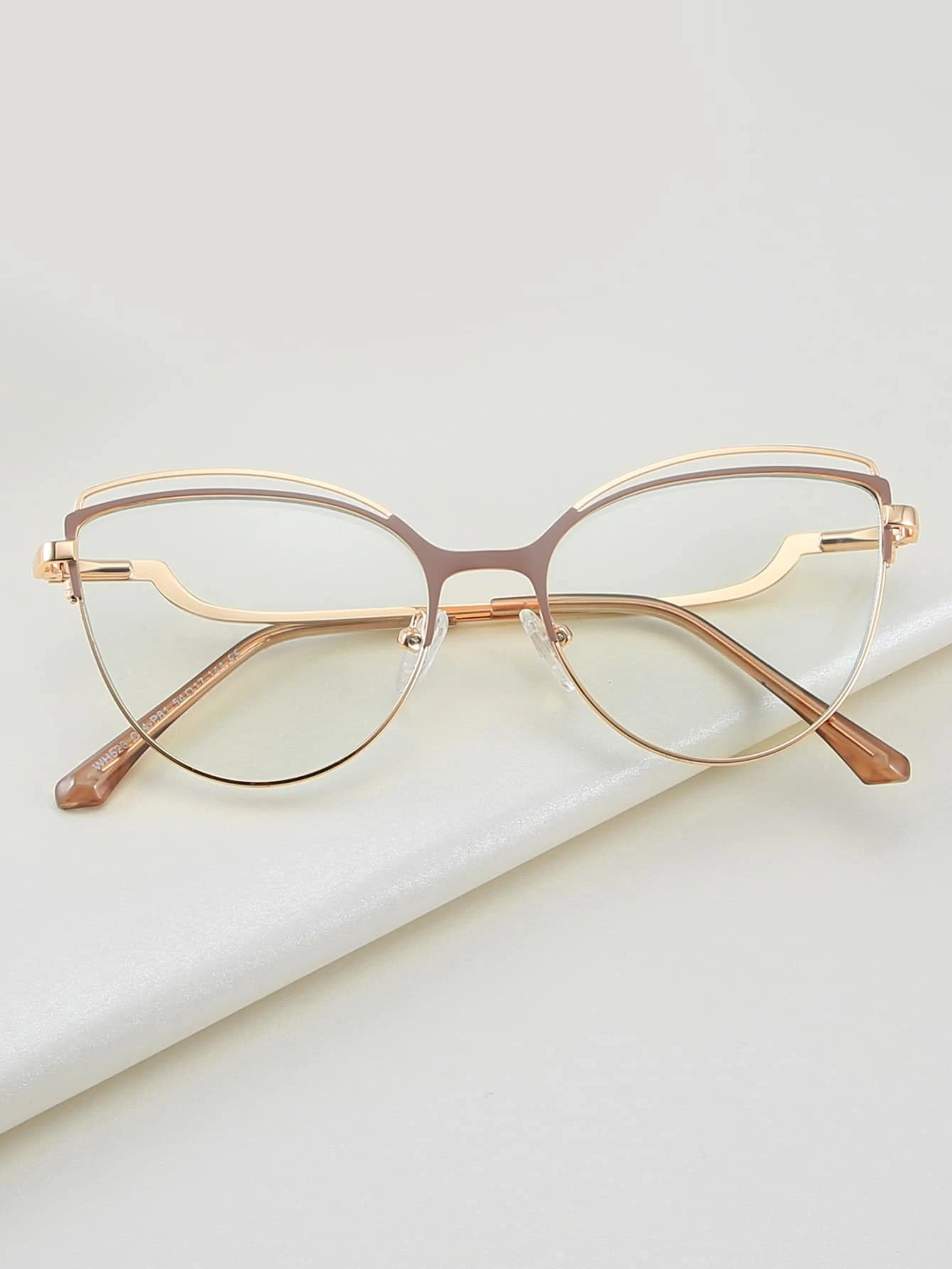 Our Anti-blue Light Cat Eye Metal Frame Eyeglasses utilizes advanced protection technology to filter out the blue light emitted by digital devices, providing you with all-day eye comfort and protection. Built with sleek metal frames and a stylish cat eye design, these glasses add a touch of sophistication to any look.
