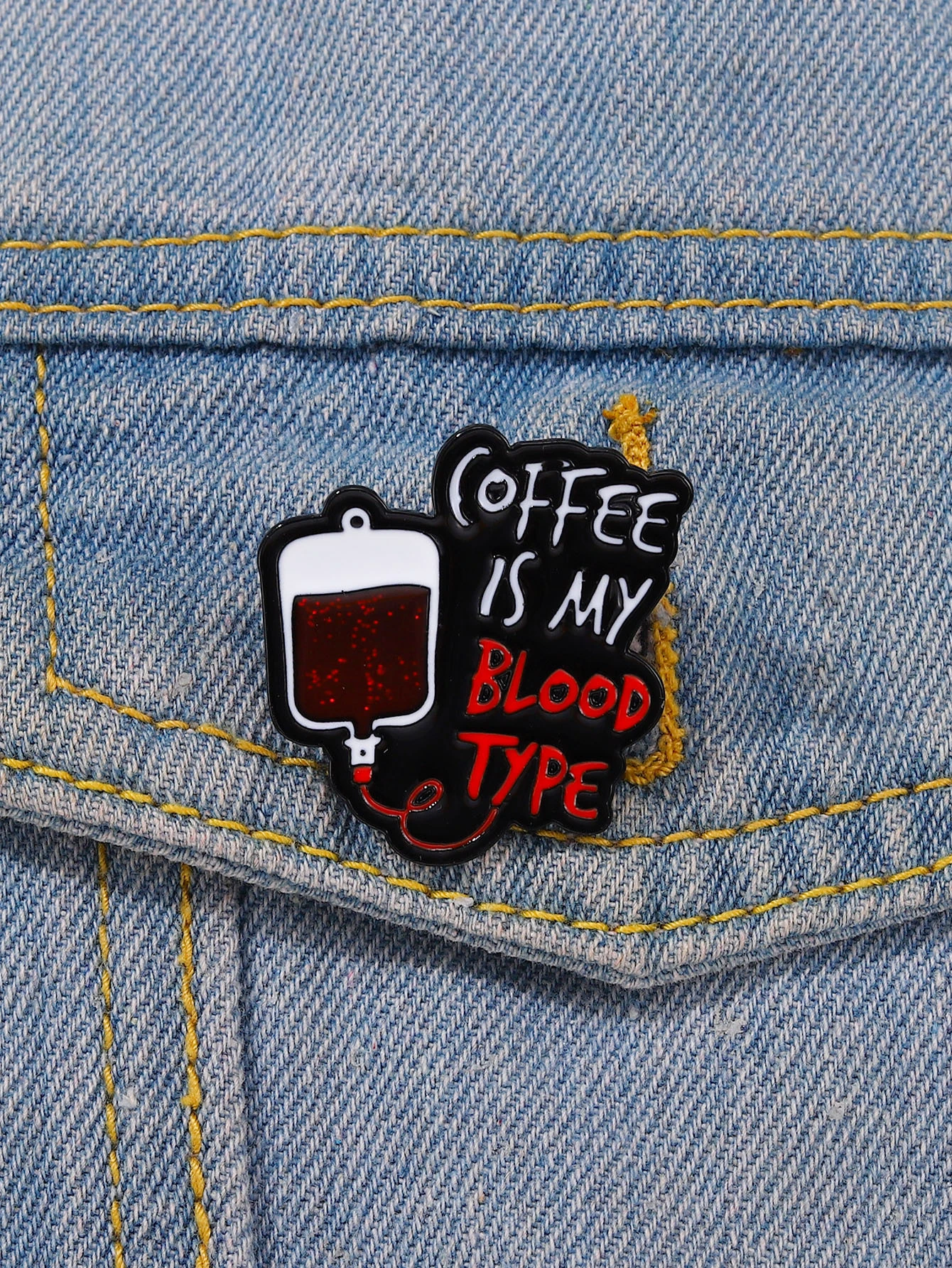 Brooch with intricate slogan detailing, adding a touch of meaningful expression and style to your attire.