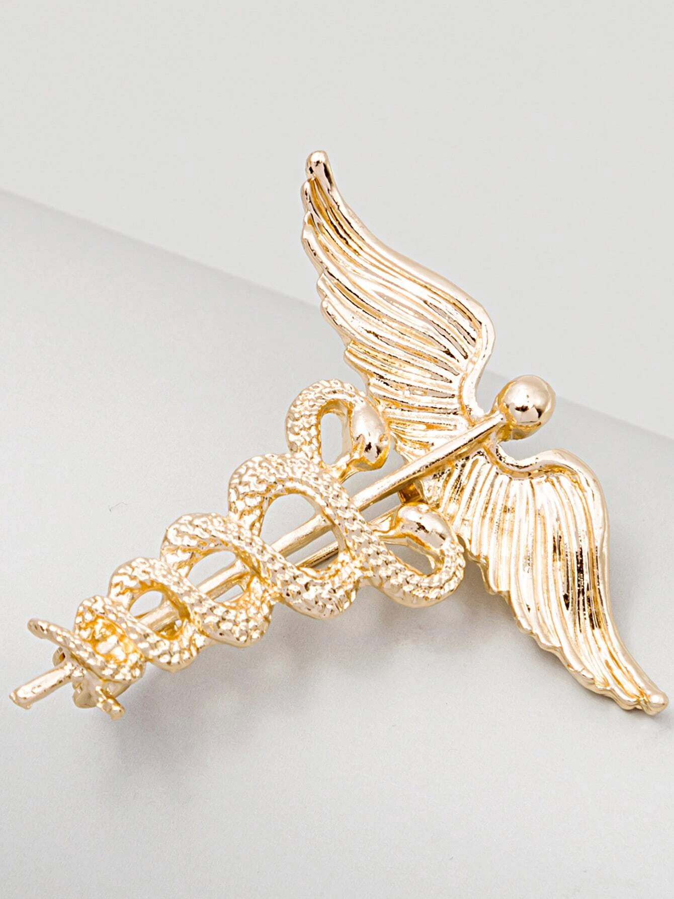 Single creative brooch, showcasing a unique and artistic design for a standout and expressive accessory.