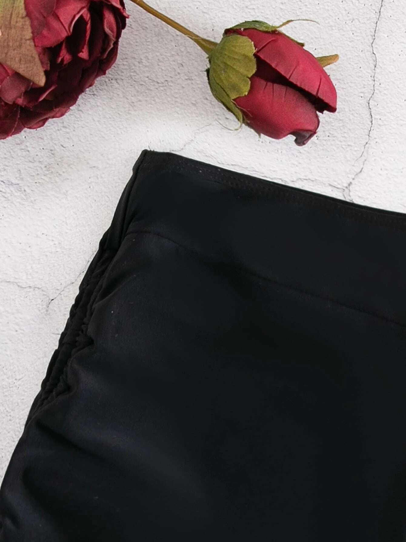 Bikini shorts with drawstring sides for adjustable fit. These shorts feature a versatile design with adjustable drawstring sides, allowing for a customizable and comfortable fit. The shorts are ideal for beach or pool activities and offer a trendy and practical swimwear option. The drawstring detail adds a touch of style while ensuring a secure and personalized fit, making these shorts a fashionable choice for any water-related outing.