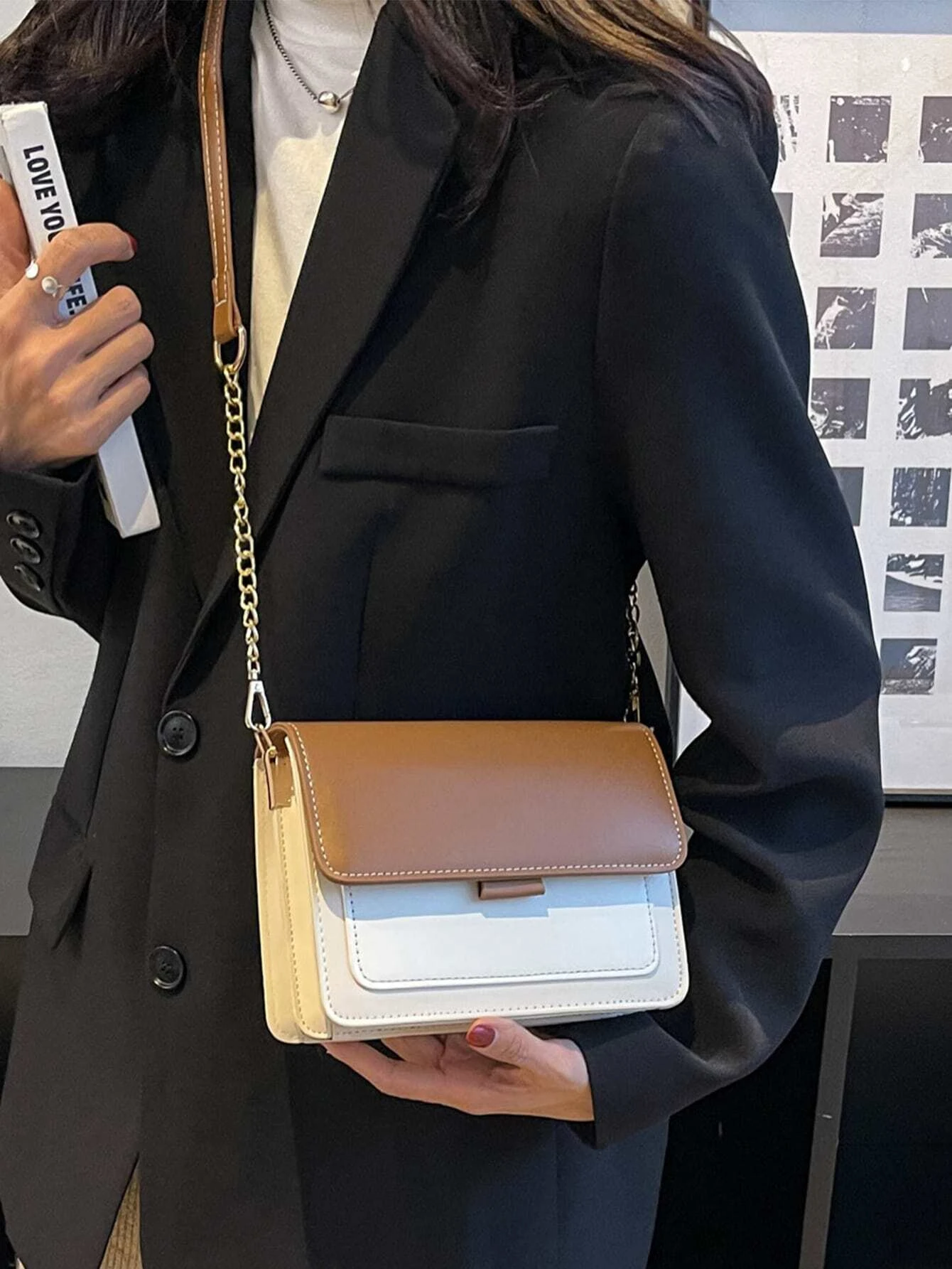 Mini square bag with color block flap design. This accessory combines modern design with vibrant color contrasts, offering a chic and stylish way to carry your essentials.