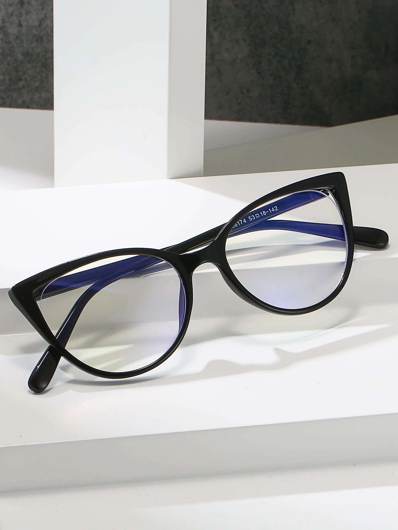 Pair of stylish Cat Eye Anti-Blue Light Eyeglasses designed to protect eyes from digital screen strain. The glasses feature a fashionable cat-eye frame shape and specialized lenses that block harmful blue light emitted by screens. These eyeglasses offer both style and eye comfort in the digital age.