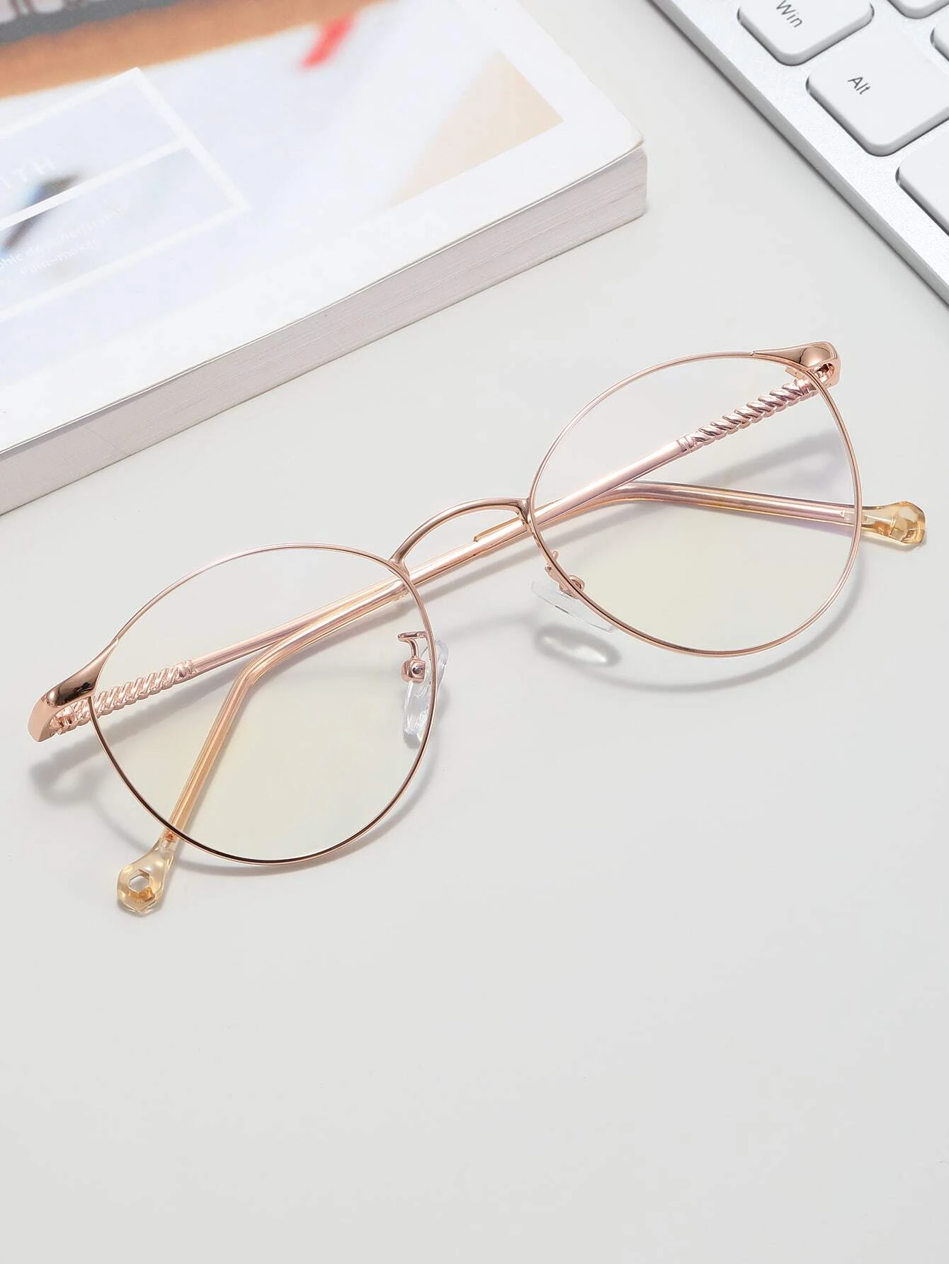 These Metal Frame Anti-Blue Light Eyeglasses offer UV400 protection and reduce blue light radiation from digital screens without sacrificing style. Their metal frame is both lightweight and durable, making them comfortable to wear for hours of continuous use. Enjoy reduced eye strain and improved sleep quality with these eyeglasses.