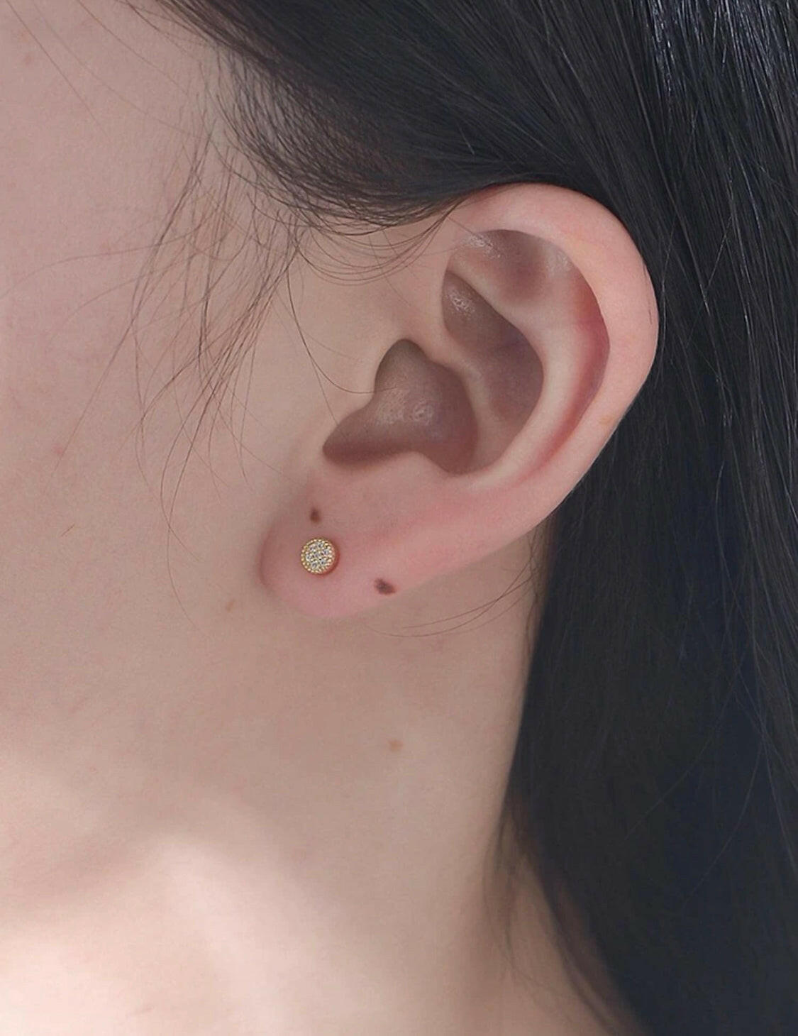 These classic cubic zirconia round decor sterling silver stud earrings are the perfect accessory for any outfit. Carefully crafted with 925 sterling silver, these earrings boast an eye-catching sparkle and shine. Studs are a timeless style that look beautiful for any occasion.