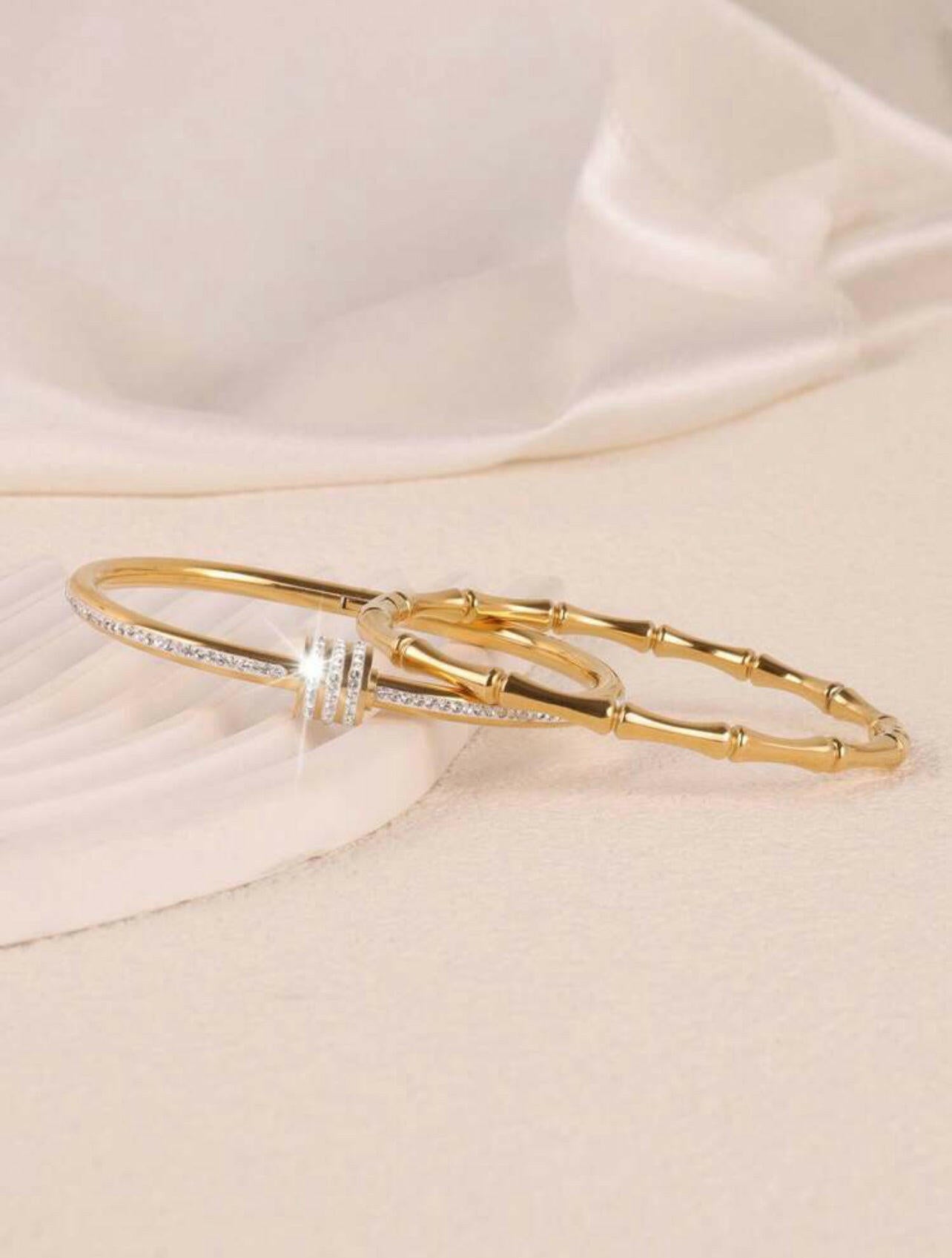 This fashionable stainless steel bracelet set will complete any look. Built to last with its strong material, this two-piece bracelet adds a touch of elegance and charm to any outfit. The high-grade stainless steel is corrosion-resistant, ensuring its durability. Handcrafted with precision for an ultra-luxurious finish.