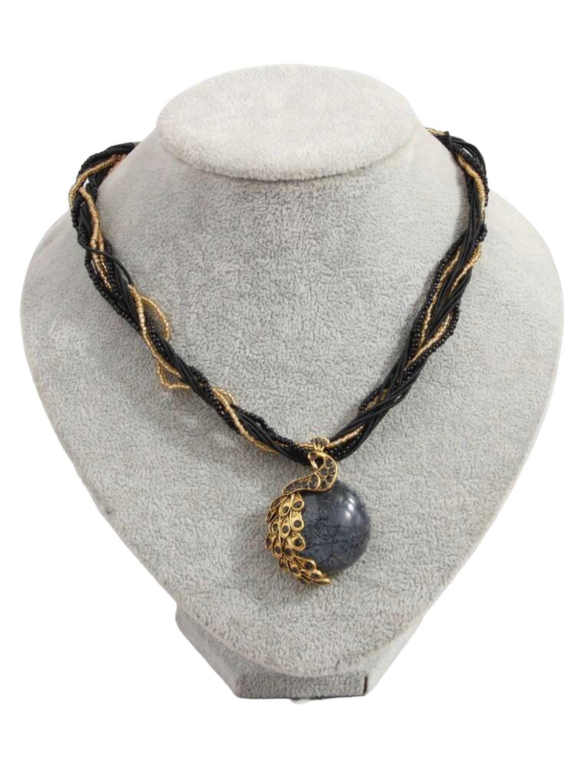 Add a timeless touch of sophistication to your wardrobe with this classic black vintage peacock shaped pendant necklace. Crafted with a stunning rhinestone-encrusted design and an exquisite gold chain, this elegant piece is the perfect accessory for your special occasions.