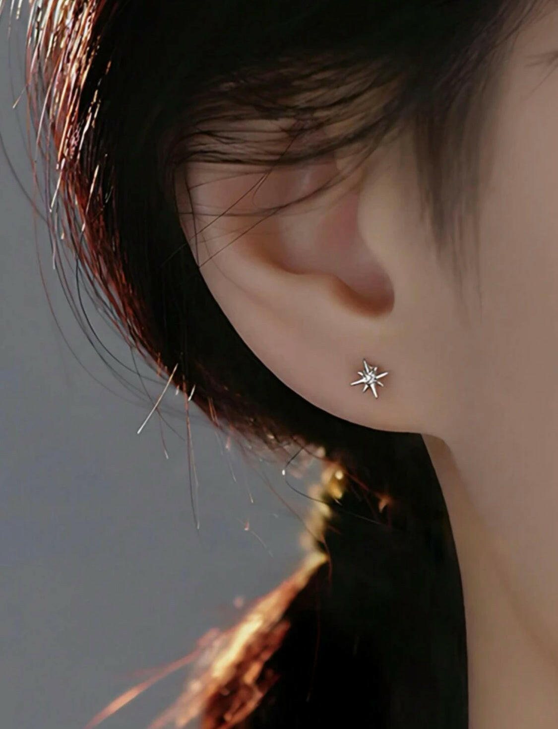 These Sterling Silver Cubic Zirconia earrings feature an eight-pointed star design, perfectly symmetrical and dazzlingly polished. Crafted with 925 silver to ensure quality and durability, they are a timeless addition to any collection.