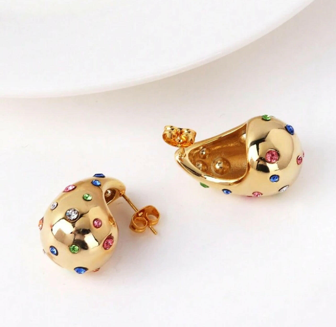 Expertly crafted with quality materials, these Gold Teardrop Earrings are a timeless addition to any jewelry collection. The sleek design and lustrous gold finish provide a versatile and sophisticated look for any occasion. A must-have for those who appreciate classic elegance and enduring style.