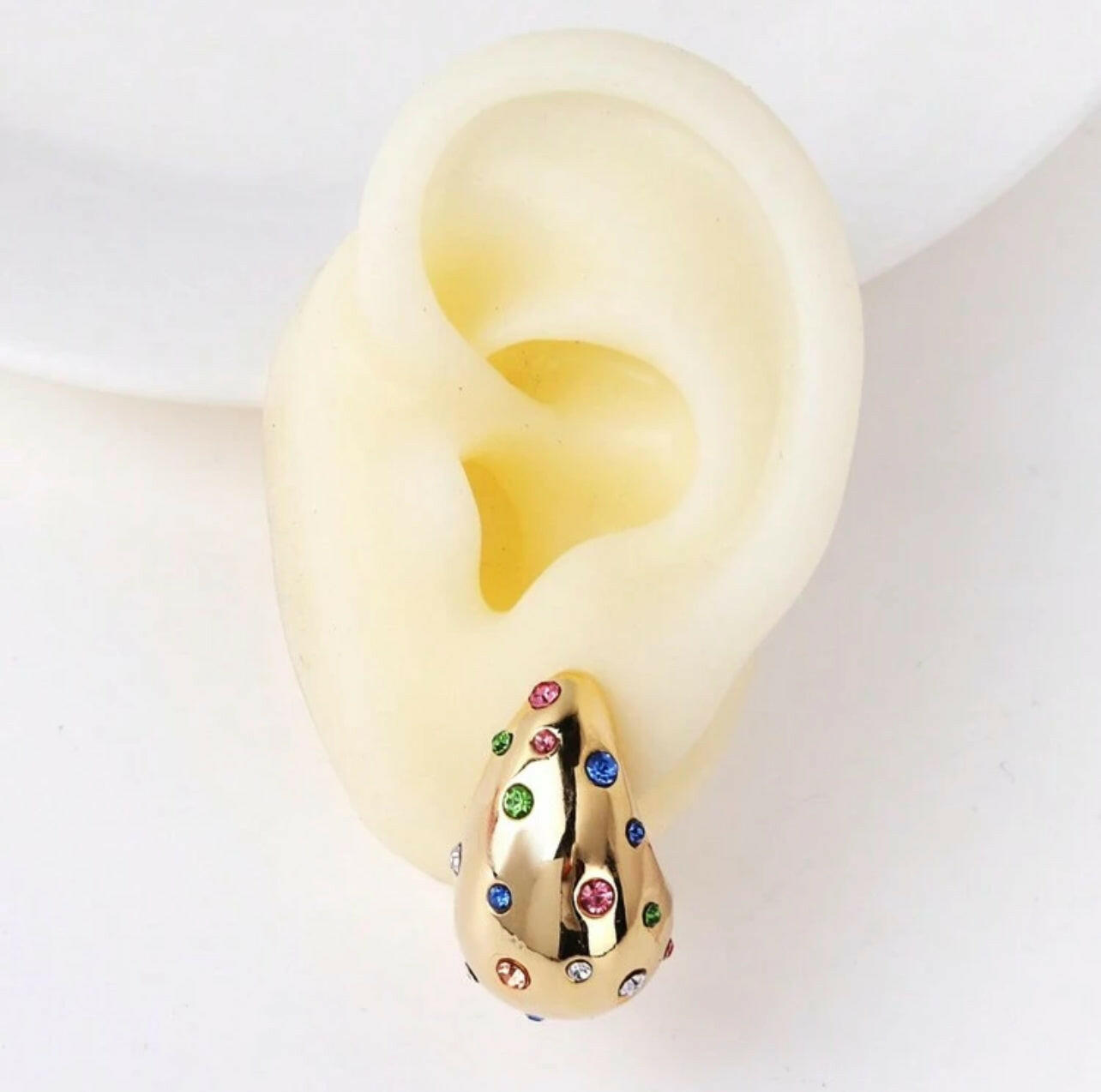 Expertly crafted with quality materials, these Gold Teardrop Earrings are a timeless addition to any jewelry collection. The sleek design and lustrous gold finish provide a versatile and sophisticated look for any occasion. A must-have for those who appreciate classic elegance and enduring style.