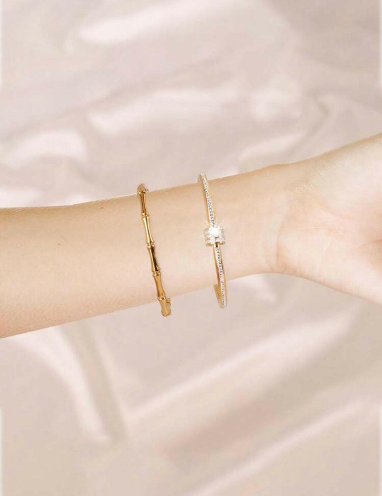 This fashionable stainless steel bracelet set will complete any look. Built to last with its strong material, this two-piece bracelet adds a touch of elegance and charm to any outfit. The high-grade stainless steel is corrosion-resistant, ensuring its durability. Handcrafted with precision for an ultra-luxurious finish.