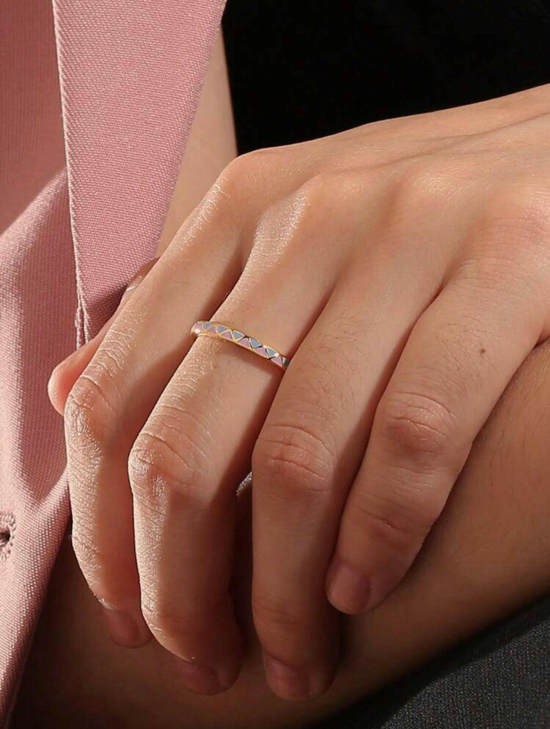 This Grid Pattern and Enamel Decor Ring features a unique design that combines an elegant grid pattern with a bright and colorful enamel finish. Its lightweight and comfortable wearability make it perfect for everyday wear.