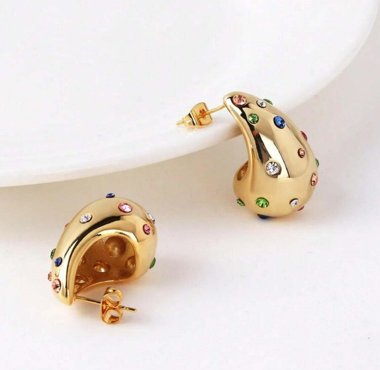 Expertly crafted with quality materials, these Gold Teardrop Earrings are a timeless addition to any jewelry collection. The sleek design and lustrous gold finish provide a versatile and sophisticated look for any occasion. A must-have for those who appreciate classic elegance and enduring style.