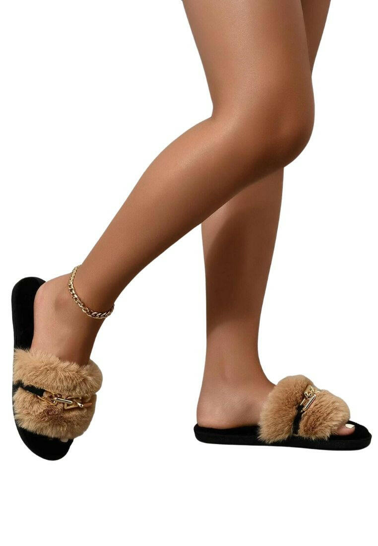Open-toe fluffy bedroom slippers adorned with delicate chain decorations, offering comfort and style. These slippers feature a soft and plush texture, keeping your feet cozy, while the chain embellishments add a touch of refinement, making them perfect for indoor relaxation with a hint of sophistication.
