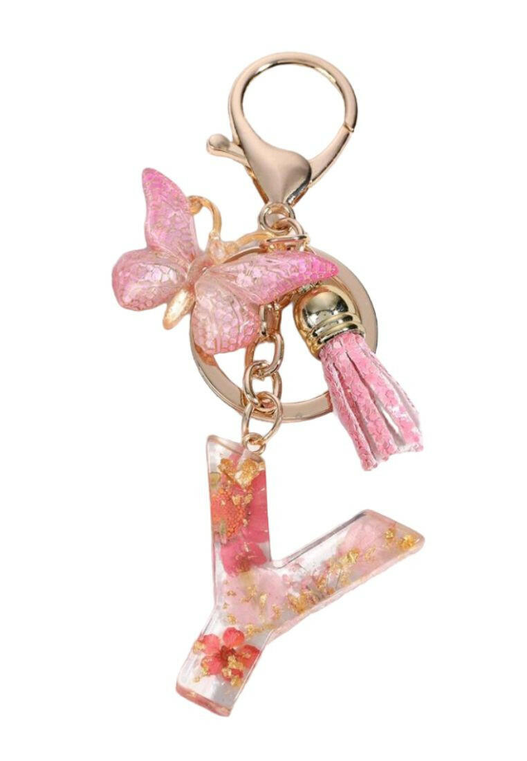 this Pink Butterfly & Tassel Decor Fashionable Keychain, you can do just that! This charming keychain features a delicate butterfly design and is perfect for adding a touch of elegance to any set of keys.