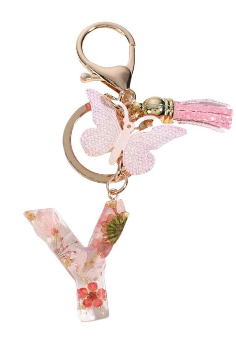 this Pink Butterfly & Tassel Decor Fashionable Keychain, you can do just that! This charming keychain features a delicate butterfly design and is perfect for adding a touch of elegance to any set of keys.