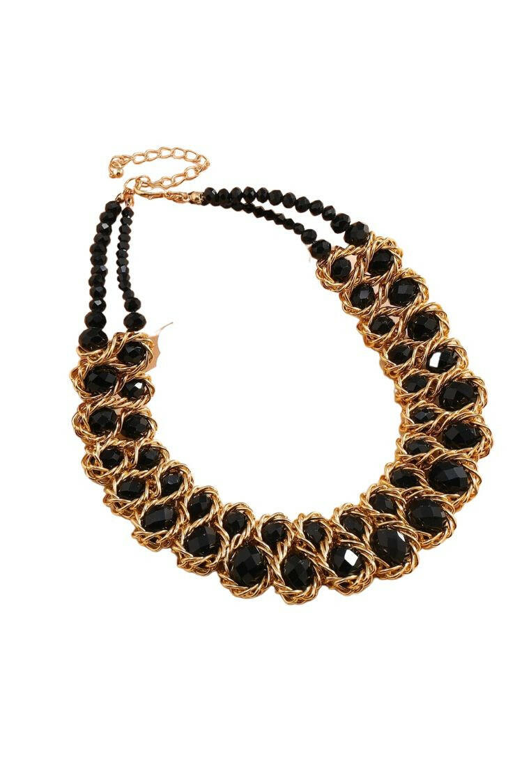 A necklace adorned with crystal decorations. The necklace features clear or colored crystals arranged in an artistic and eye-catching pattern. This accessory is elegant and versatile, adding a touch of sparkle and sophistication to various outfits.