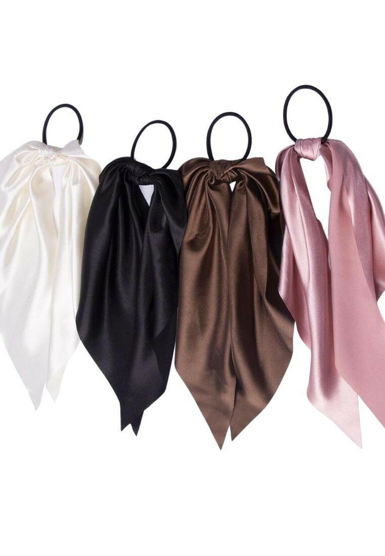 A collection of four knot-style hair ties, providing a simple yet fashionable way to secure and style your hair.