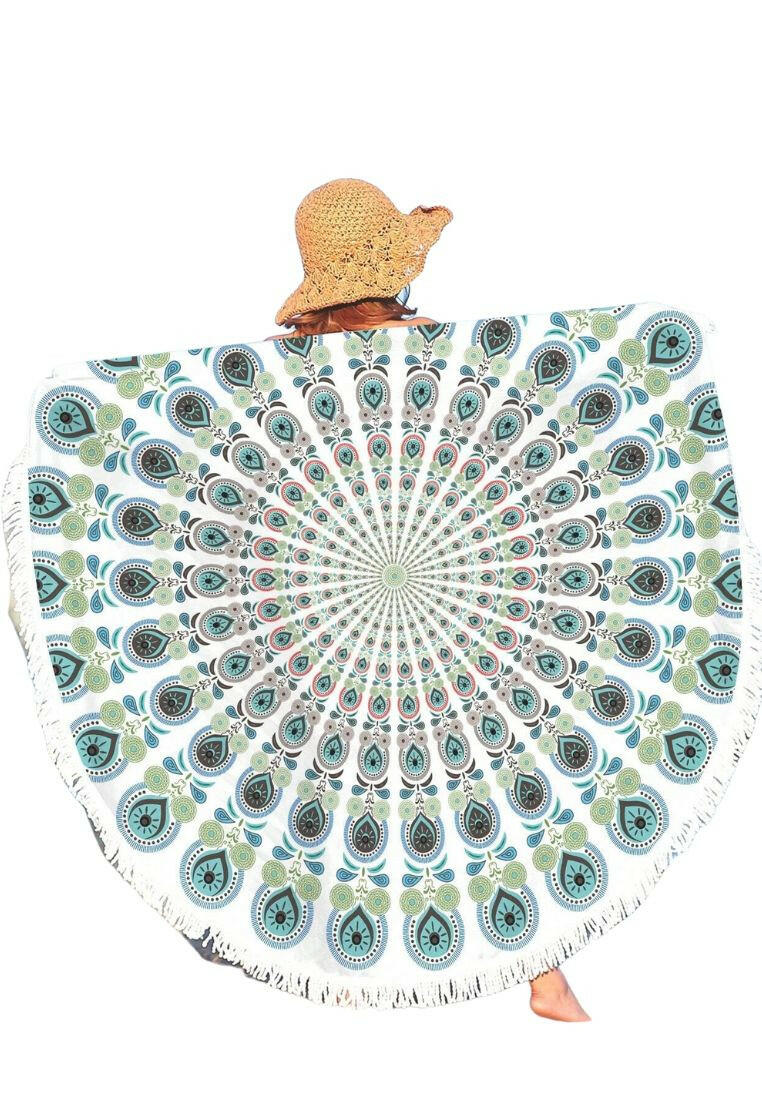 A beach towel adorned with a green mandala pattern and fringe trim. The towel showcases an intricate mandala design in shades of green, with decorative fringe trim along the edges. This towel is both stylish and practical, suitable for beach days or outdoor relaxation. The green mandala pattern and fringe trim add a touch of bohemian charm to the towel.