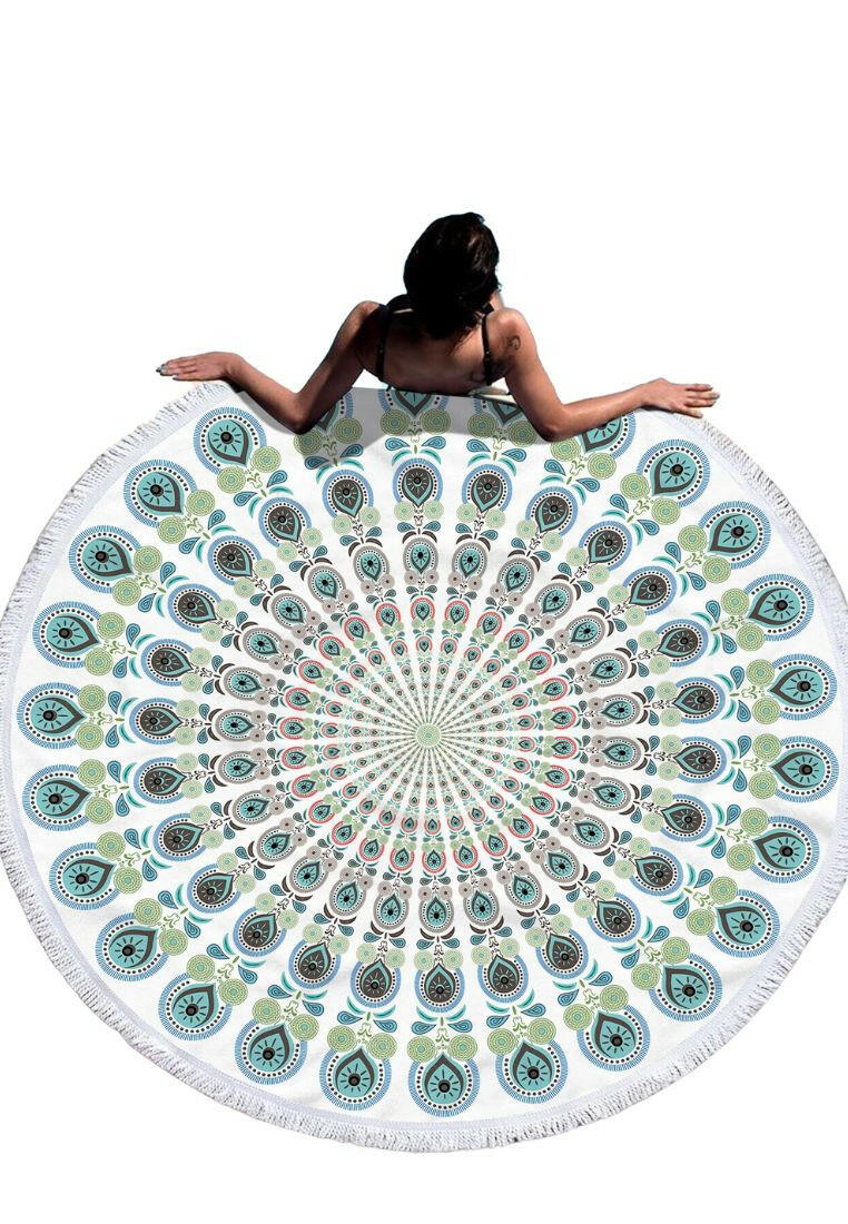 A beach towel adorned with a green mandala pattern and fringe trim. The towel showcases an intricate mandala design in shades of green, with decorative fringe trim along the edges. This towel is both stylish and practical, suitable for beach days or outdoor relaxation. The green mandala pattern and fringe trim add a touch of bohemian charm to the towel.