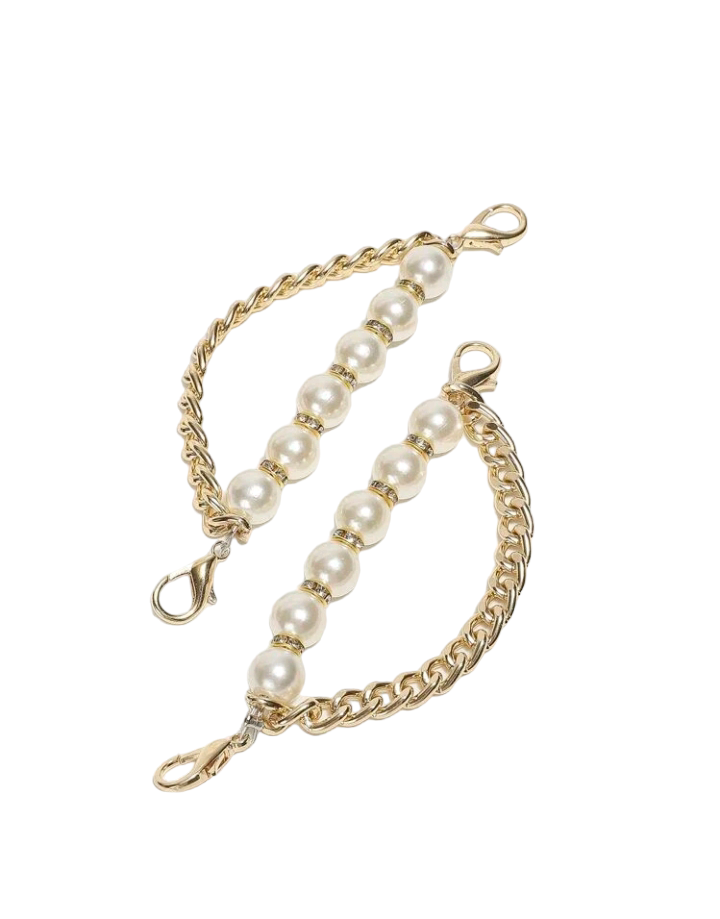 Two shoe decorations featuring faux pearl and chain embellishments. These shoe accessories add a touch of sophistication and elegance to your footwear, with faux pearls and dainty chains, creating a stylish and refined look.