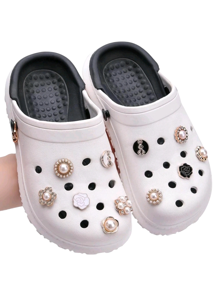 A set of eleven shoe decorations featuring metal and faux pearl designs, perfect for adding an elegant touch to footwear.