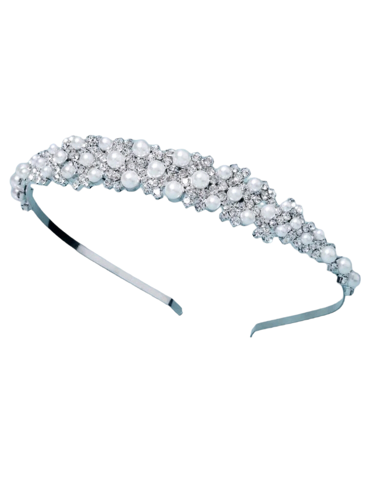 A bridal headband adorned with rhinestones and faux pearls, creating an exquisite and elegant accessory that adds a touch of timeless beauty and sophistication to a bride's ensemble.
