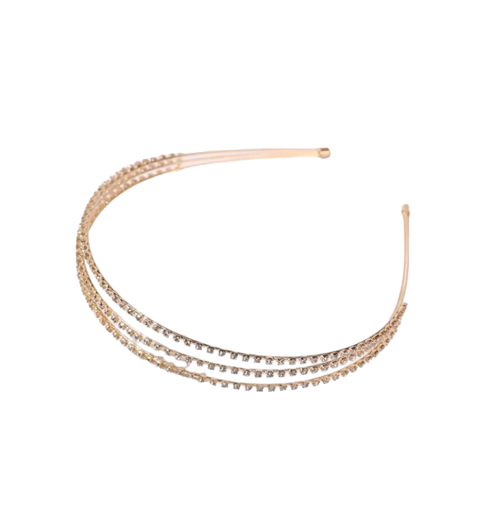 A fashion headband adorned with solid rhinestone decorations, creating a glamorous and stylish accessory that adds a touch of sparkle and sophistication to any hairstyle.
