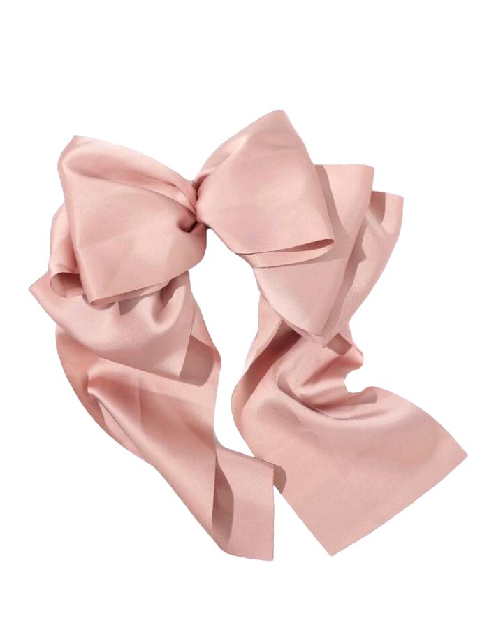 A lovely pink bow decorated hair clip, adding a touch of sweetness and elegance to your hairstyle. This chic accessory is perfect for enhancing your look with a charming and stylish detail.