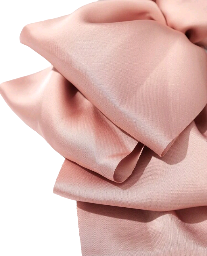A lovely pink bow decorated hair clip, adding a touch of sweetness and elegance to your hairstyle. This chic accessory is perfect for enhancing your look with a charming and stylish detail.