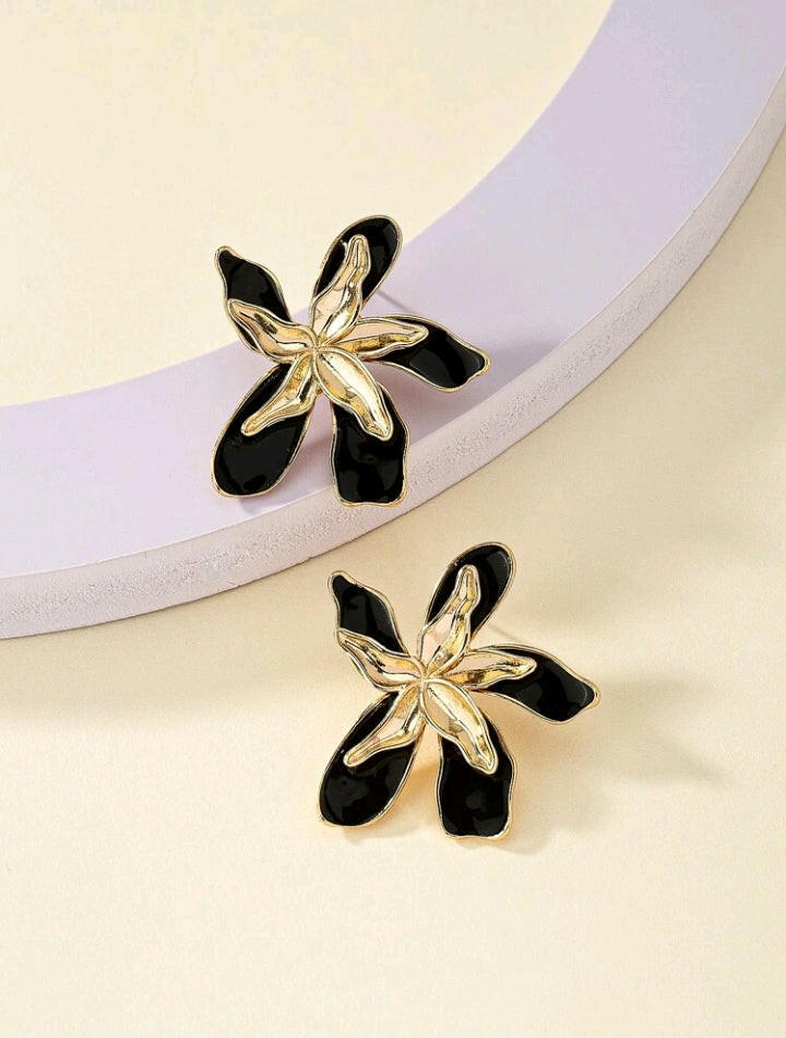 Set of two flower design stud earrings, each featuring intricate petal and floral motifs. These earrings offer versatile and elegant options to complement your style.
