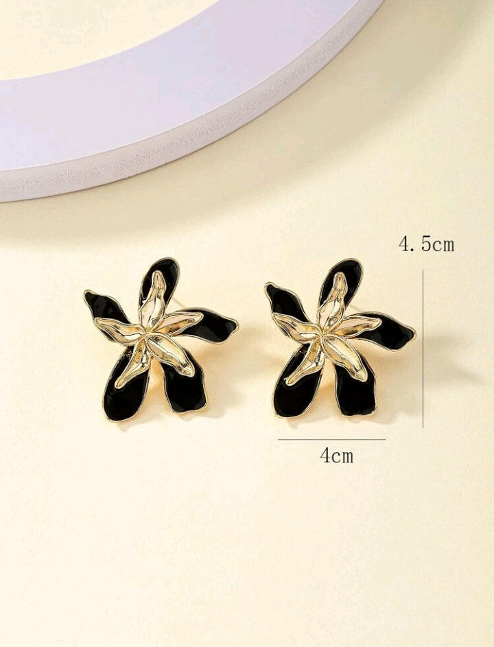 Set of two flower design stud earrings, each featuring intricate petal and floral motifs. These earrings offer versatile and elegant options to complement your style.