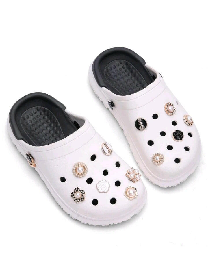 A set of eleven shoe decorations featuring metal and faux pearl designs, perfect for adding an elegant touch to footwear.