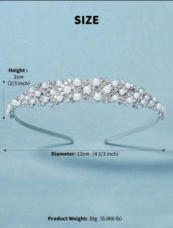 A bridal headband adorned with rhinestones and faux pearls, creating an exquisite and elegant accessory that adds a touch of timeless beauty and sophistication to a bride's ensemble.