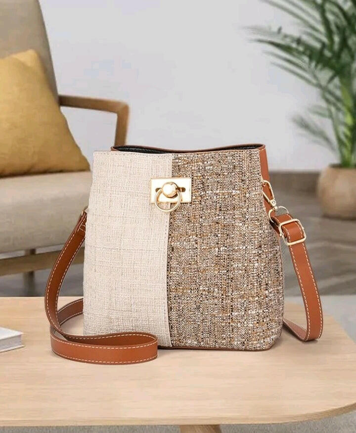 This stylish Color Block Bucket Bag elevates your everyday look with its eye-catching color-block design. Crafted from premium materials, this bag is designed to last and the adjustable shoulder strap ensures maximum comfort. Perfect for daily errands, work and even weekend getaways!