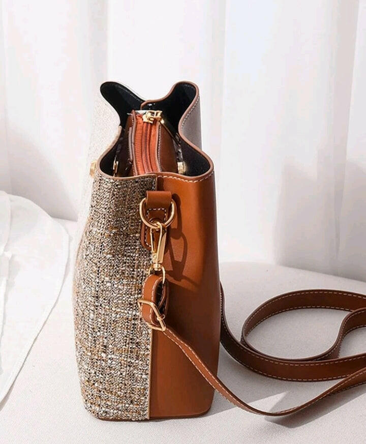 This stylish Color Block Bucket Bag elevates your everyday look with its eye-catching color-block design. Crafted from premium materials, this bag is designed to last and the adjustable shoulder strap ensures maximum comfort. Perfect for daily errands, work and even weekend getaways!