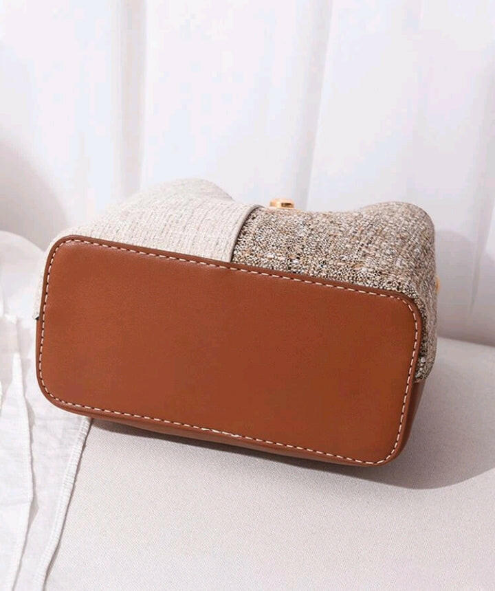 This stylish Color Block Bucket Bag elevates your everyday look with its eye-catching color-block design. Crafted from premium materials, this bag is designed to last and the adjustable shoulder strap ensures maximum comfort. Perfect for daily errands, work and even weekend getaways!