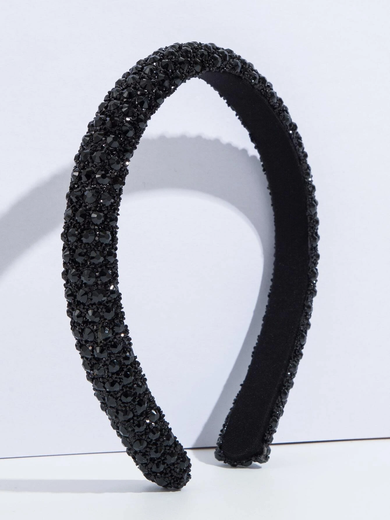 Headband adorned with rhinestone decorations, adding a touch of elegance and sparkle to your hair accessory.