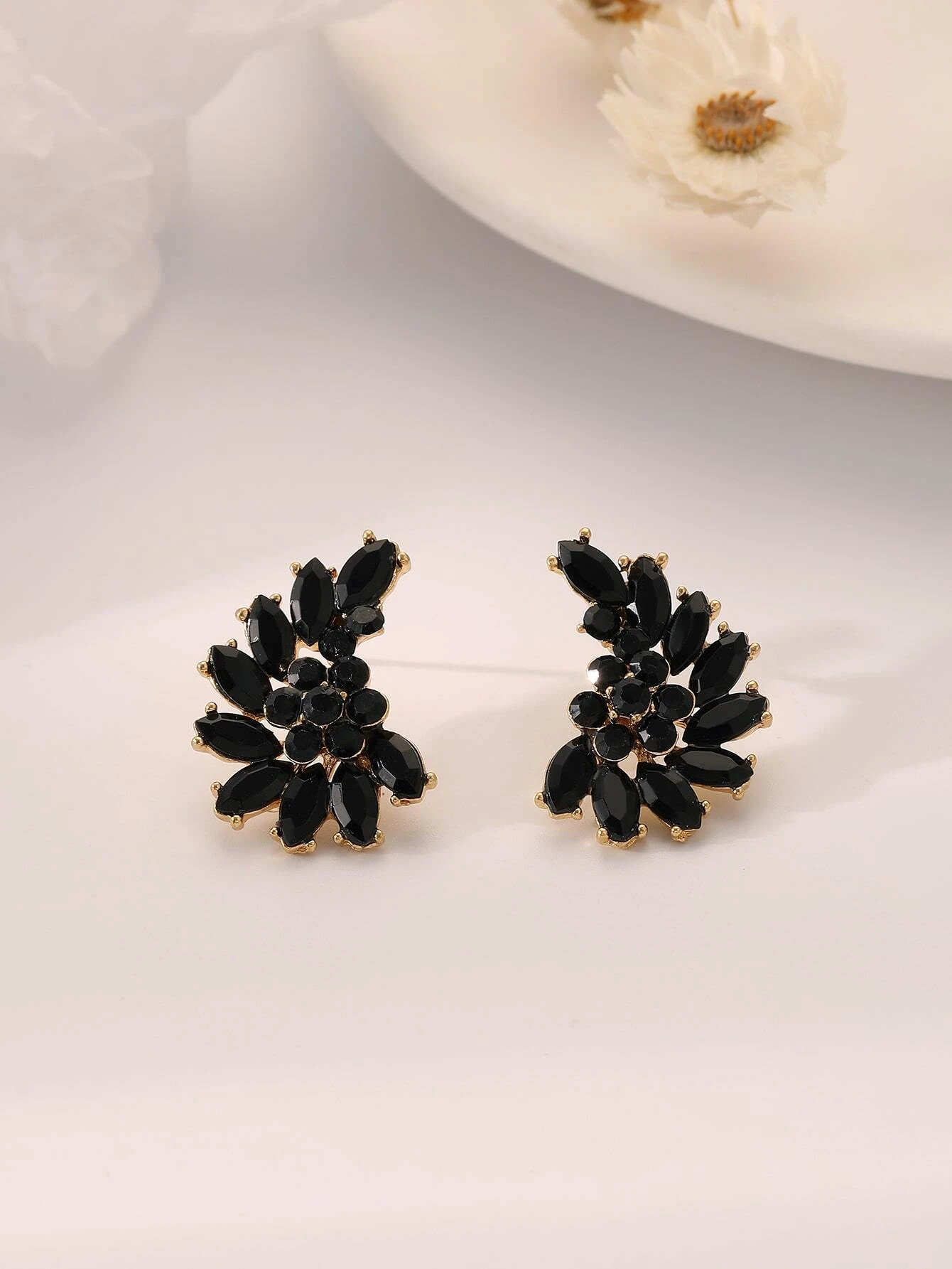 Black rhinestone decor stud earrings, elegant accessories featuring black gemstones, adding a touch of sophistication and sparkle to your look.